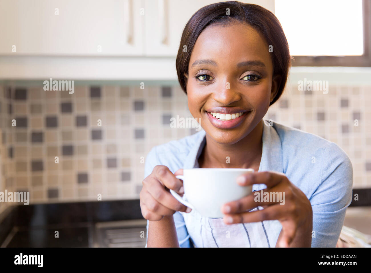 portrait of pretty African girl drinking coffee Stock Photo Alamy