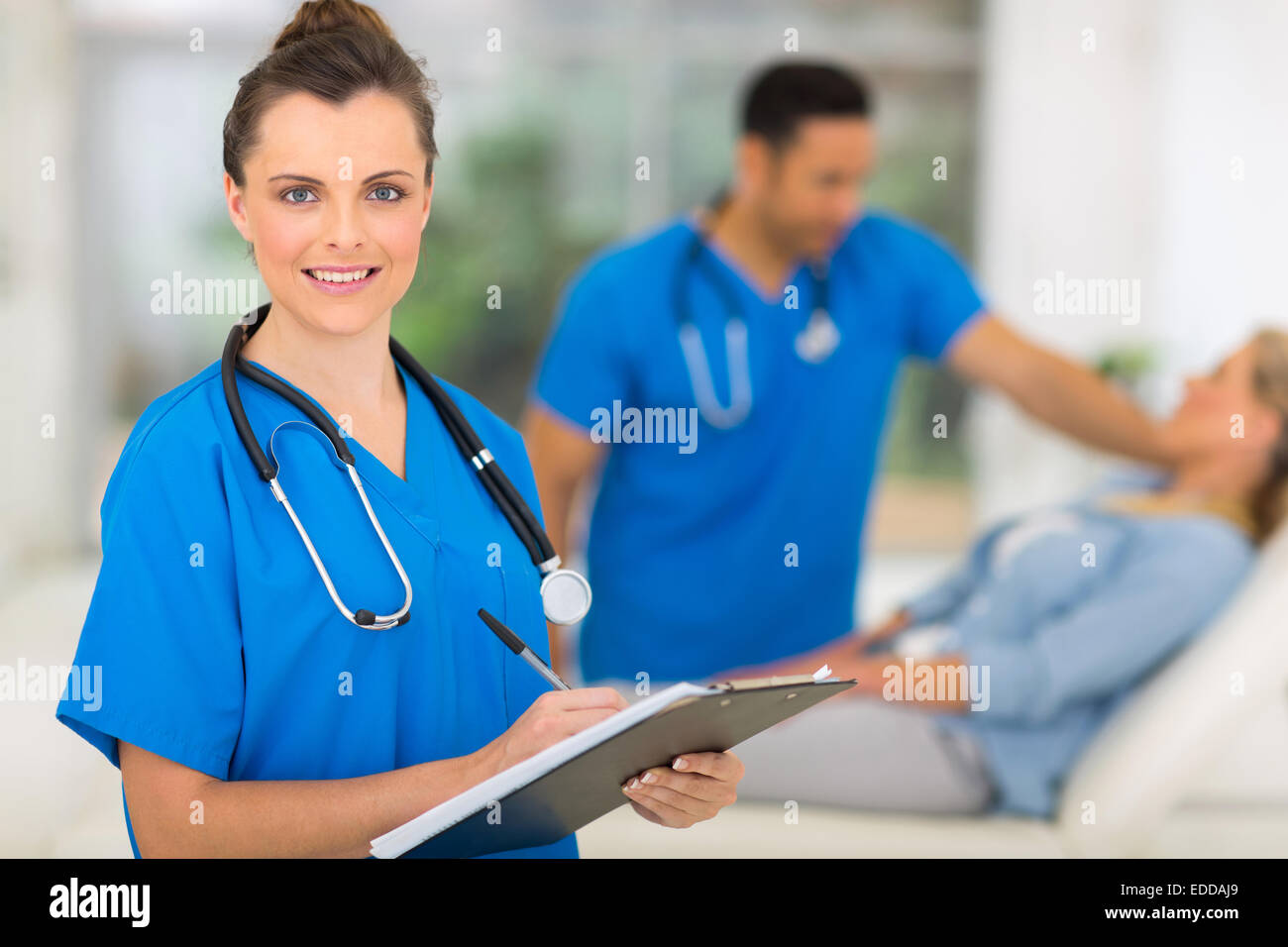 portrait of gorgeous nurse holding clipboard Stock Photo - Alamy