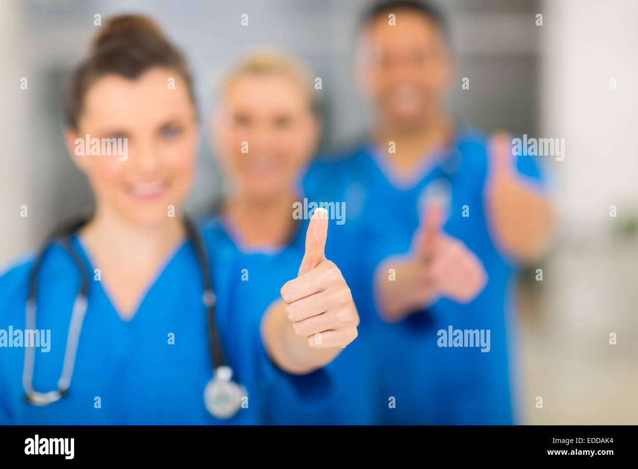 group of successful hospital staff thumbs up Stock Photo