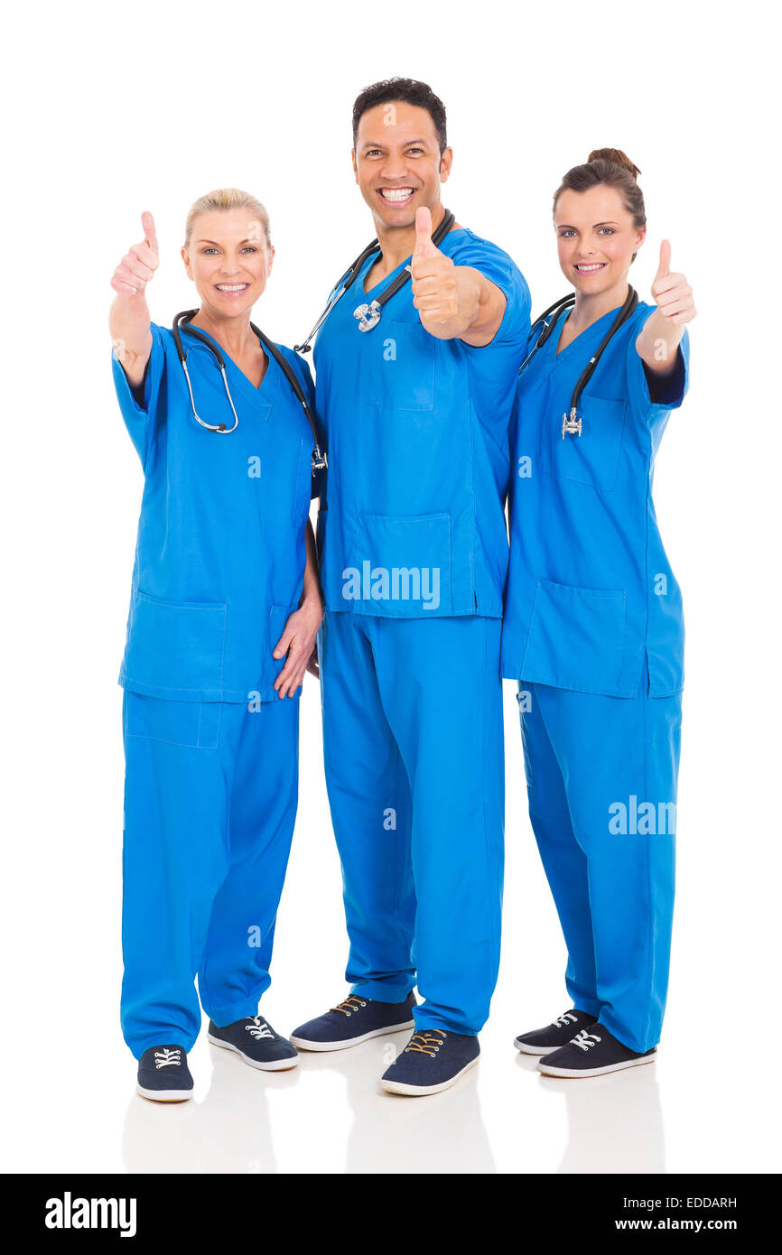group of cheerful healthcare workers thumbs up Stock Photo