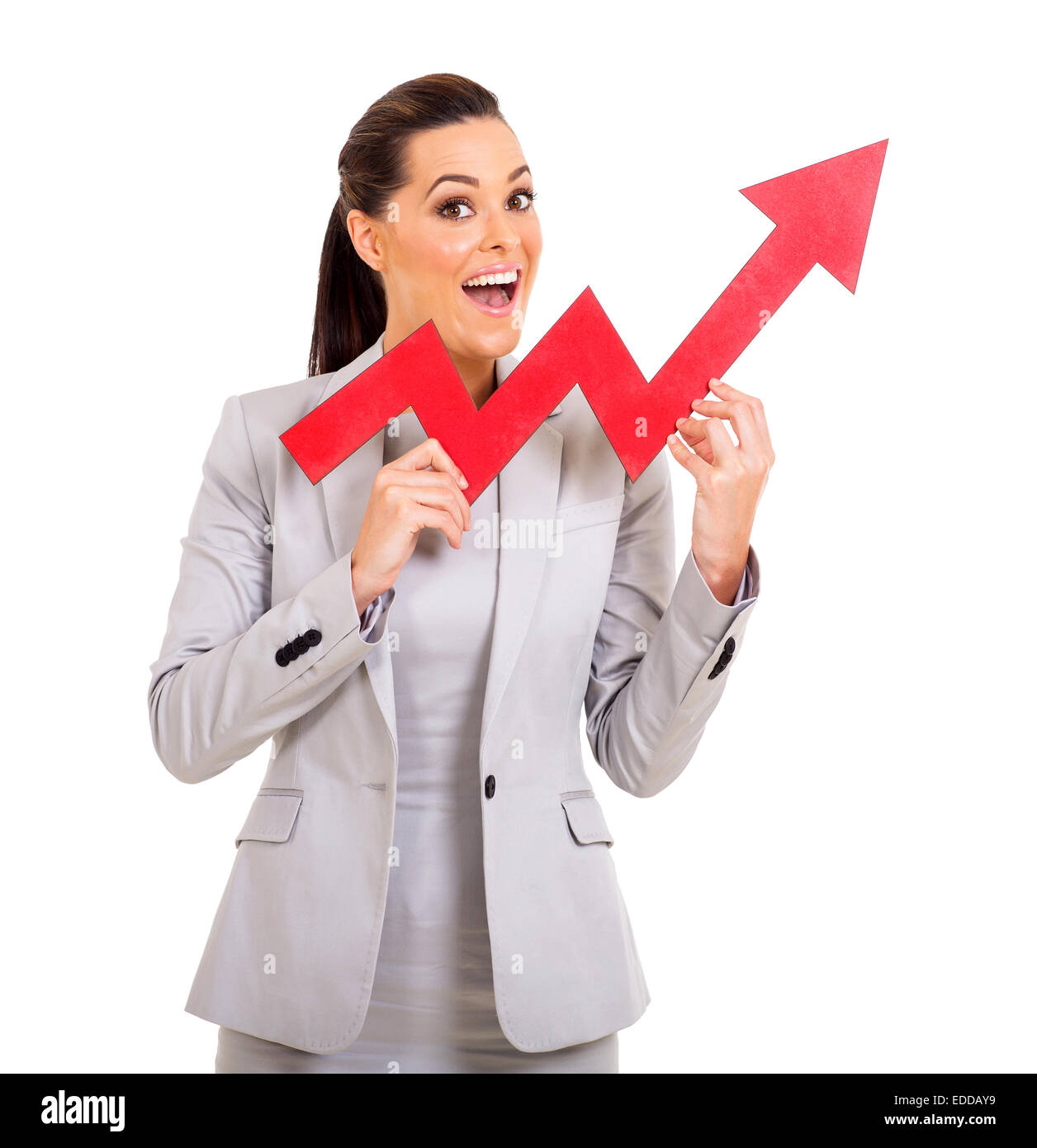 excited young businesswoman with red growth arrow Stock Photo