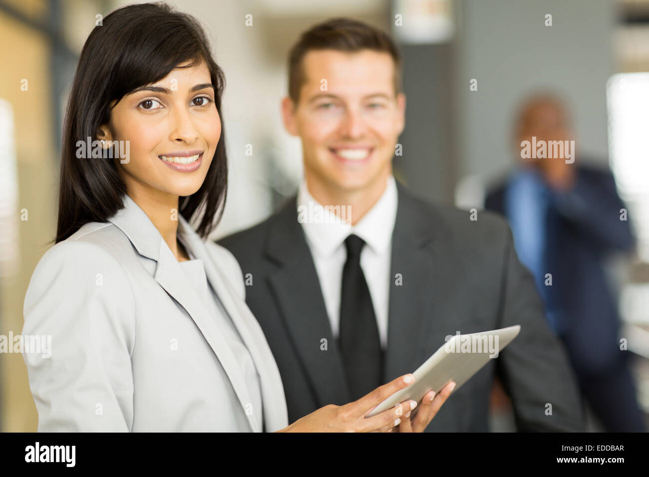 beautiful young Indian businesswoman with co-worker Stock Photo