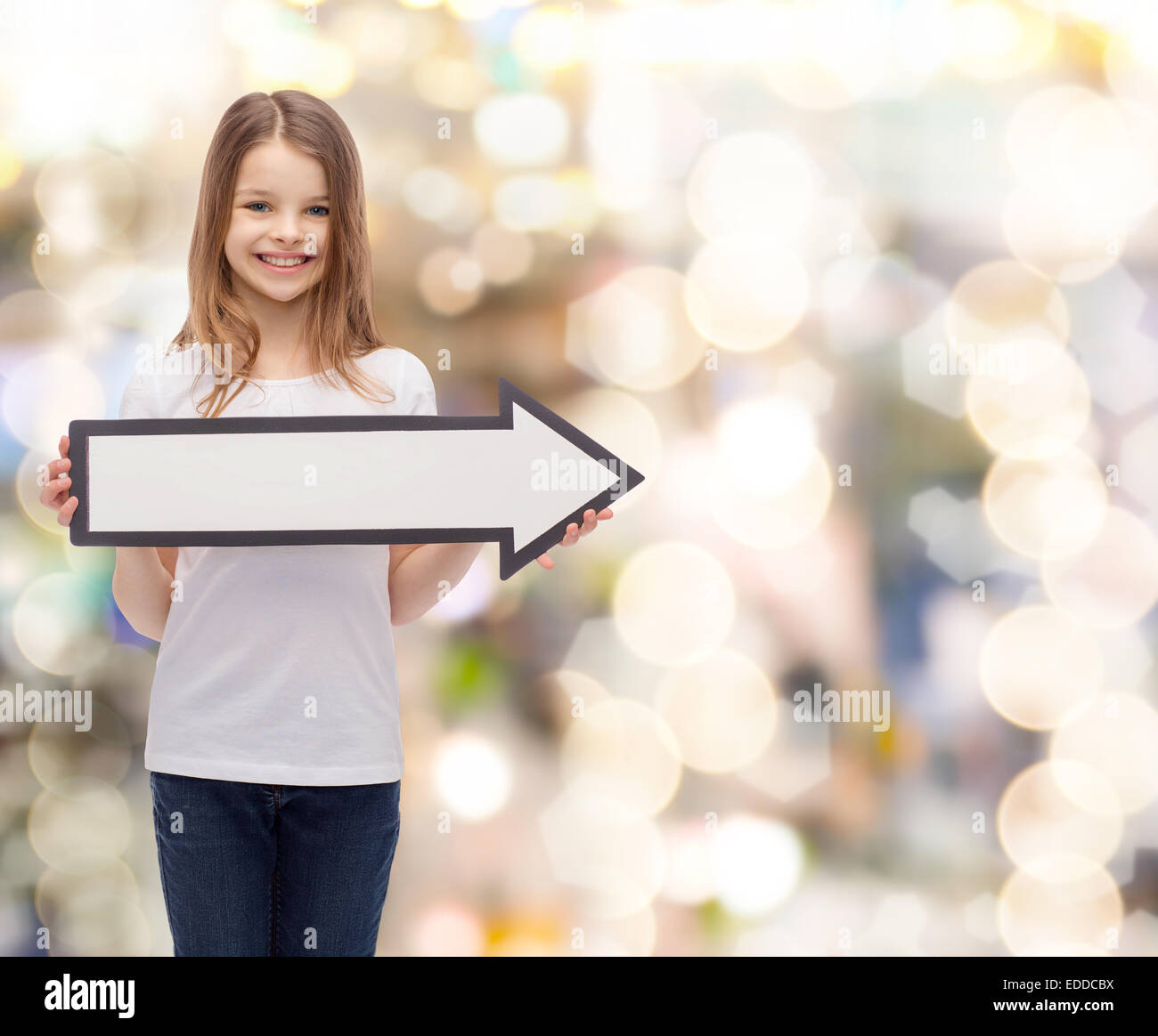 smiling girl with blank arrow pointing right Stock Photo - Alamy
