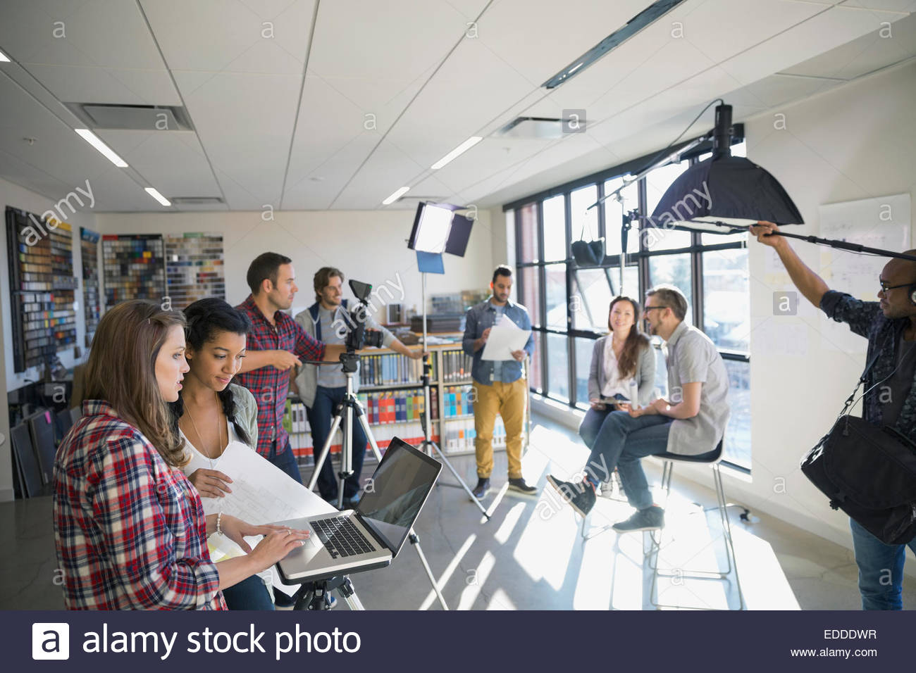 Business people shooting video tutorial Stock Photo