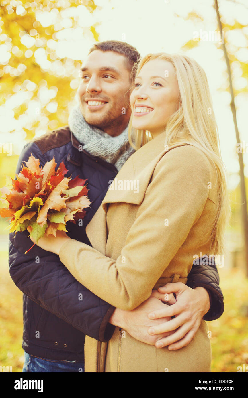 romantic couple in the autumn park Stock Photo - Alamy