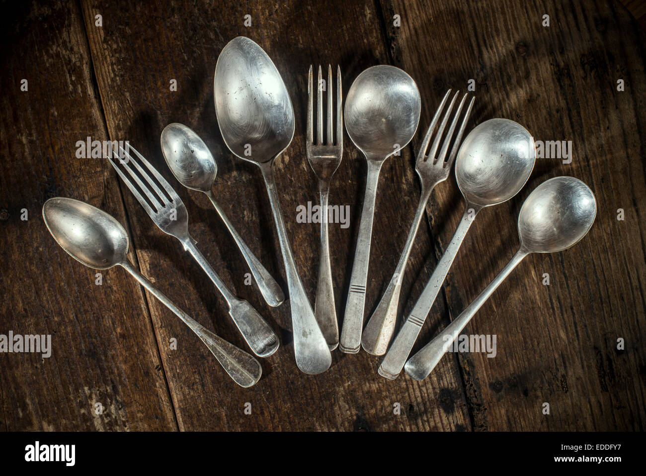 Arrangement of old forks and spoons Stock Photo Alamy