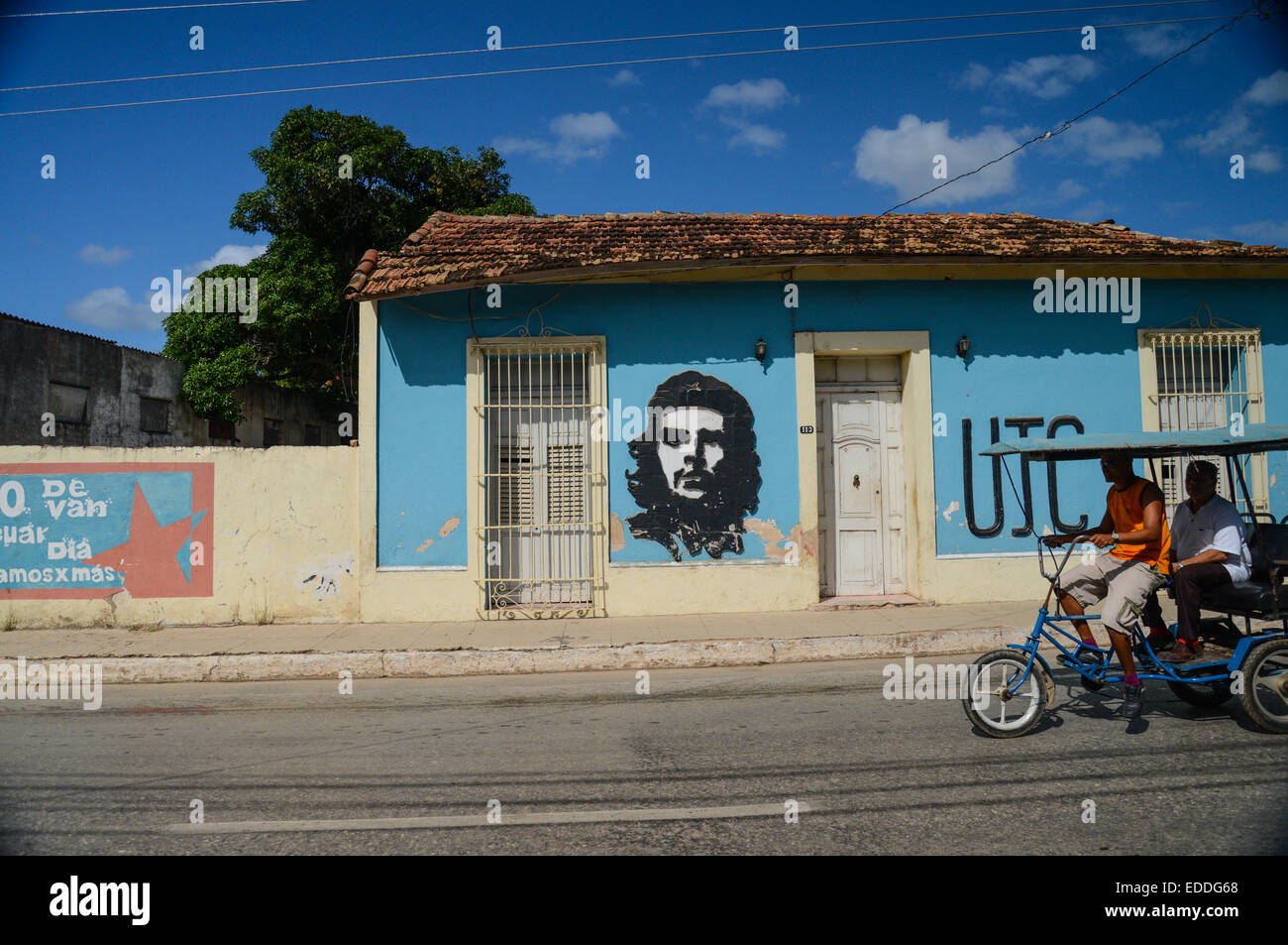 TRINIDAD, CUBA - DECEMBER 11, 2014: Cuban taxi bicycle ride on street of Trinidad,CUBA. Stock Photo