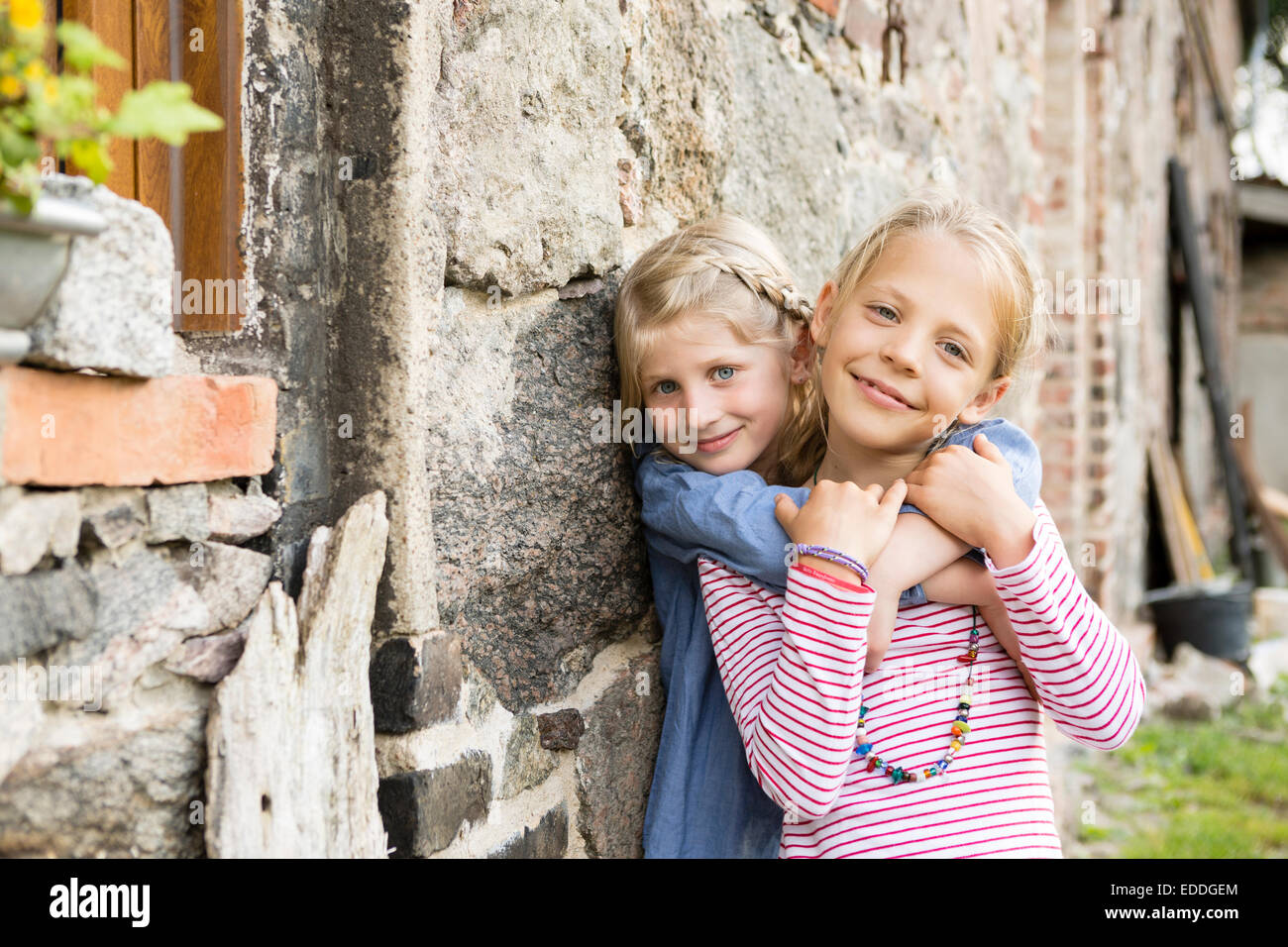 Portrait of two smiling little girls Stock Photo - Alamy