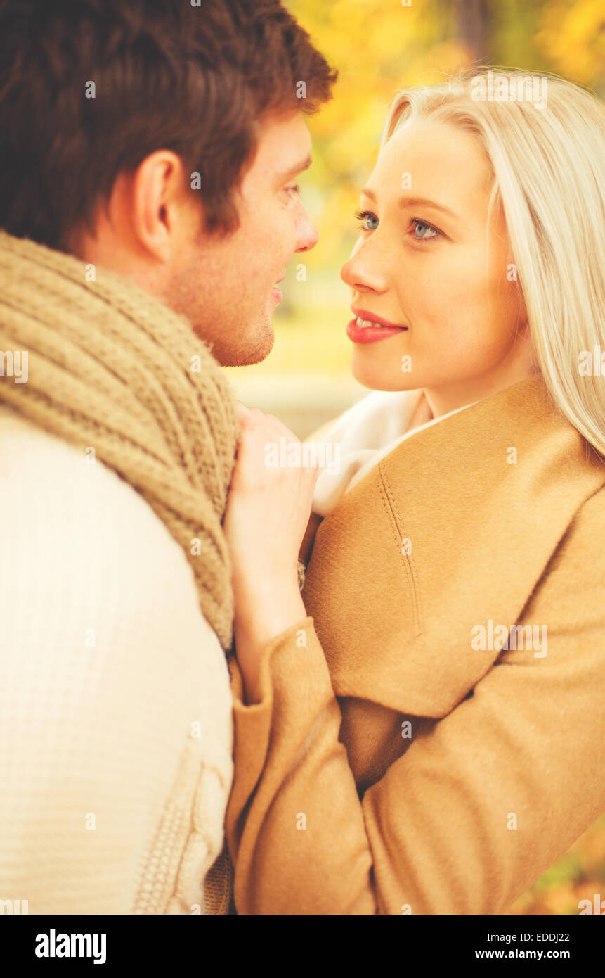 romantic couple kissing in the autumn park Stock Photo - Alamy