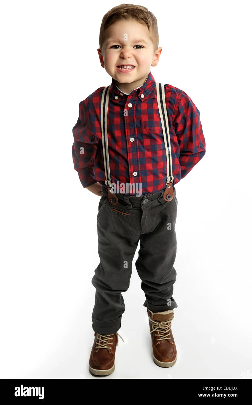 Little boy wearing suspenders pouting mouth Stock Photo Alamy