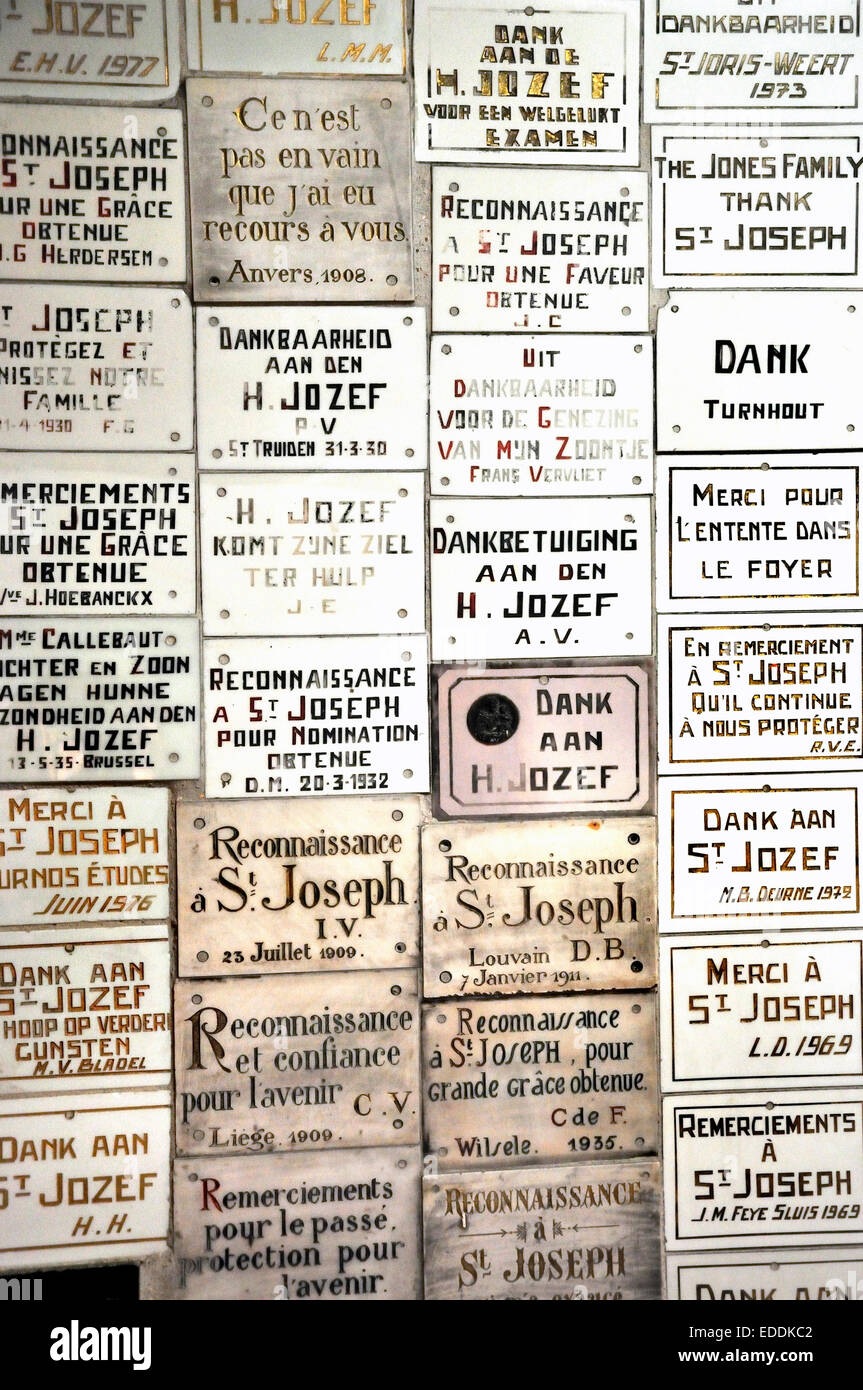 Leuven / Louvain, Belgium. Sint Antonius Kapel - 14thC but transformed in 1961 into memorial to Father Damien - votive plaques Stock Photo