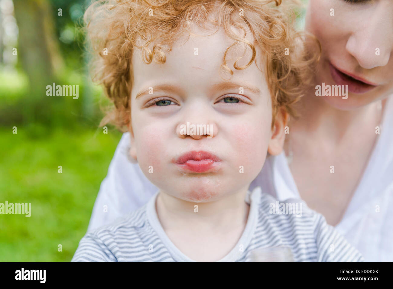 Portrait of little boy pouting mouth Stock Photo