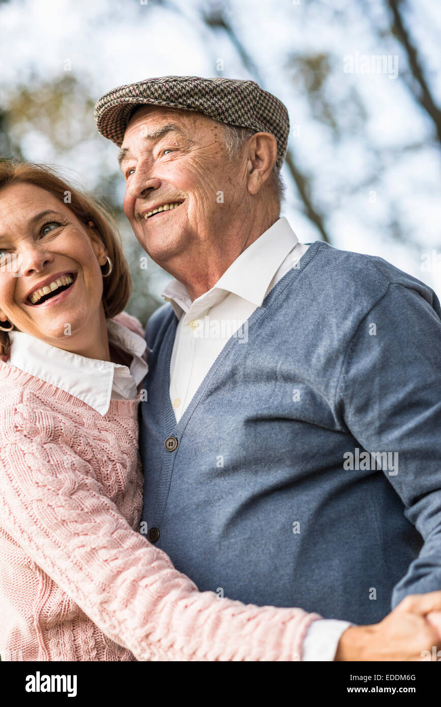 Happy senior man with daughter outdoors Stock Photo