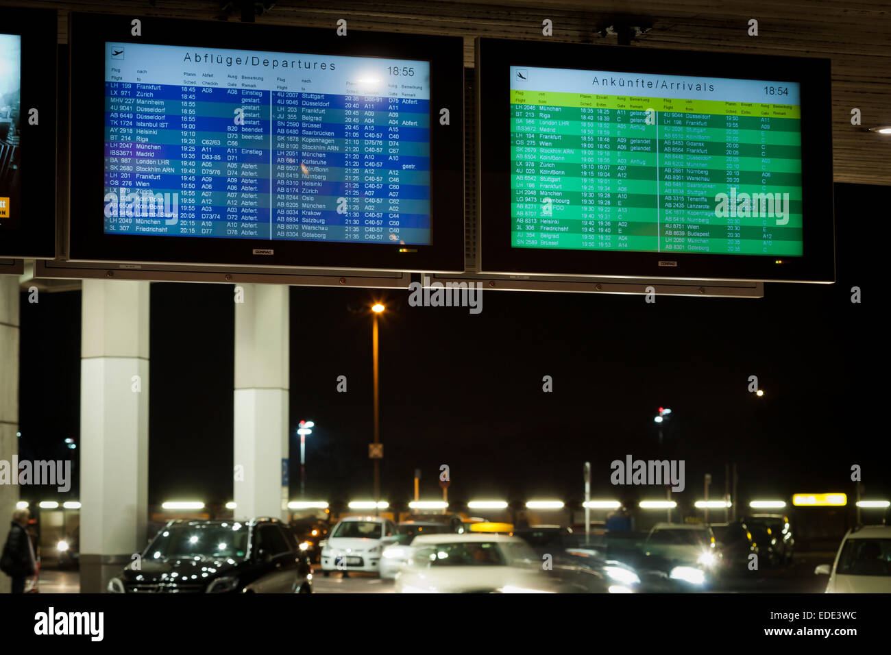 nightshot of flight schedules with departures and arrivals at the airport. Photo: December 16, 2014. Stock Photo