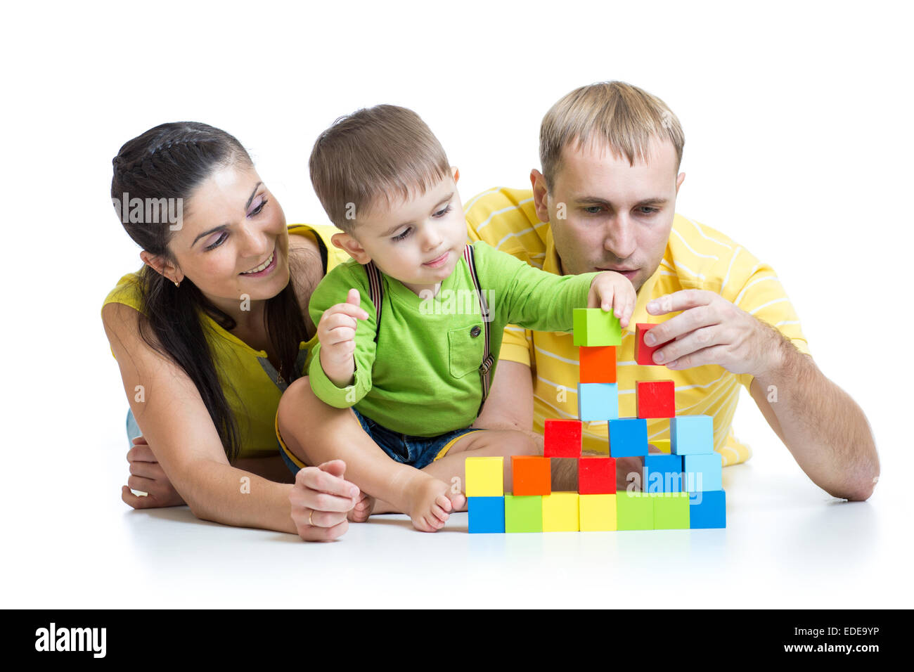 kid with his parents play building blocks Stock Photo