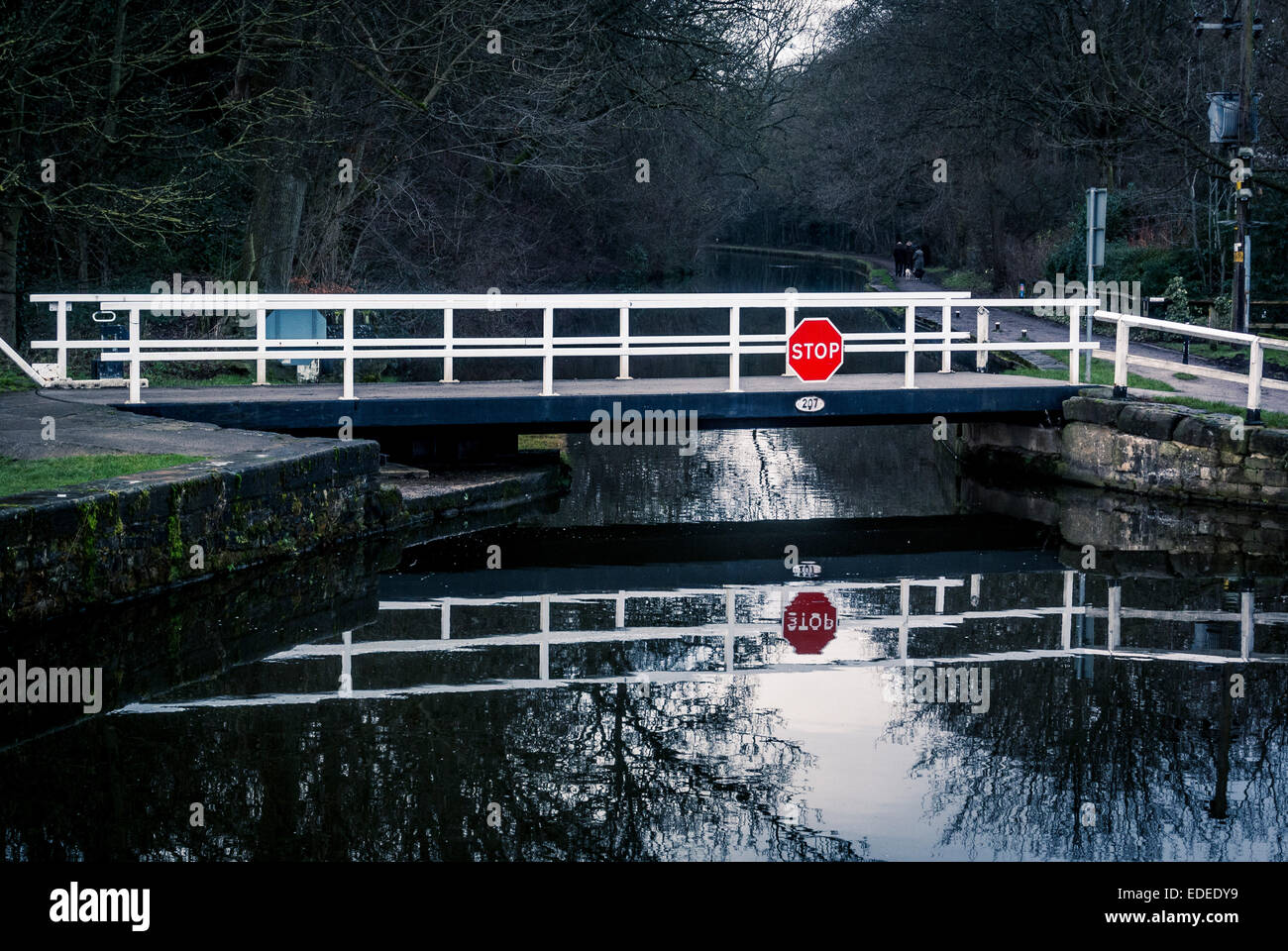 Road Swing bridge at Hirst Lock, Leeds Liverpool Canal, Saltaire, West Yorkshire, UK. Stock Photo