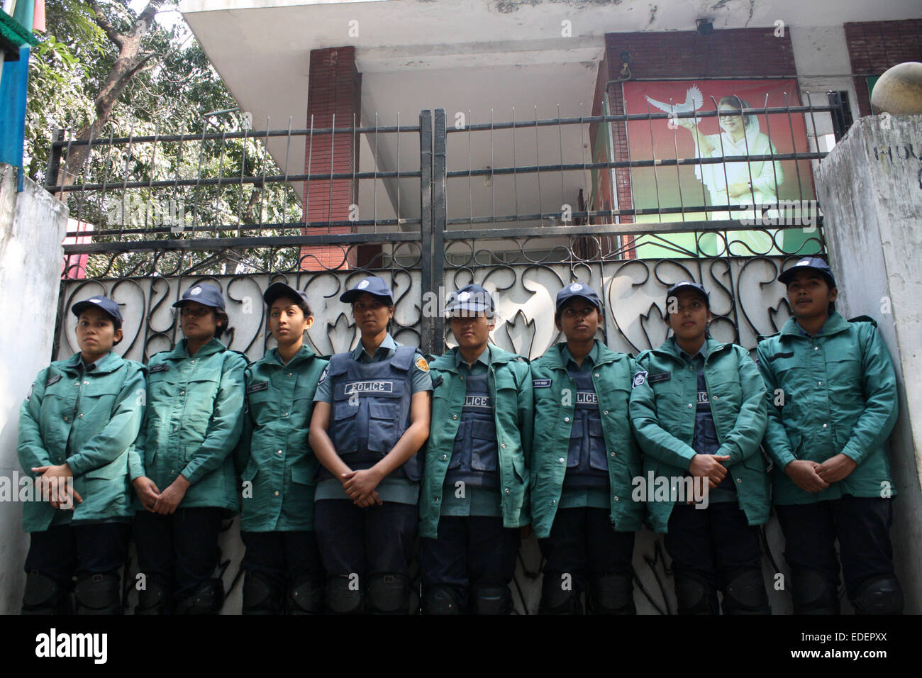 Dhaka, Bangladesh. 6th January, 2015. BNP chairperson Khaleda Zia is still confined to her Gulshan office where she has been since Saturday night. The main gate is still under lock and key while a police officer seeking anonymity said there are around 100 policemen deployed around Khaled’a office. Credit:  Mamunur Rashid/Alamy Live News Stock Photo