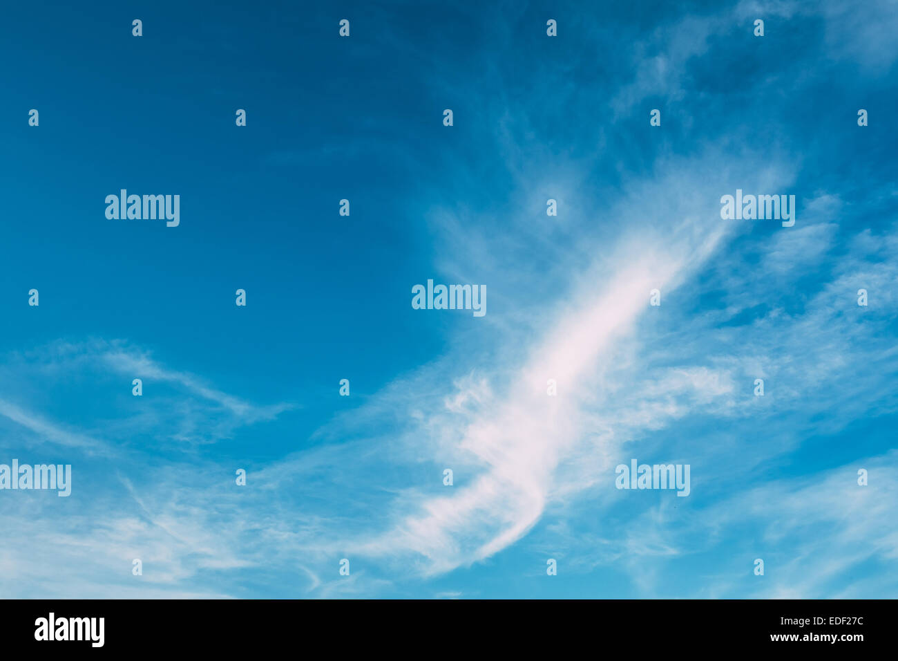 blue sky background with white fluffy clouds Stock Photo - Alamy
