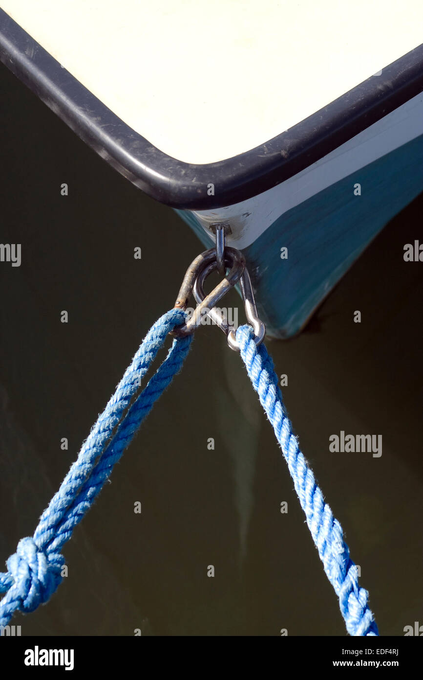Blue mooring lines on a small boat Stock Photo