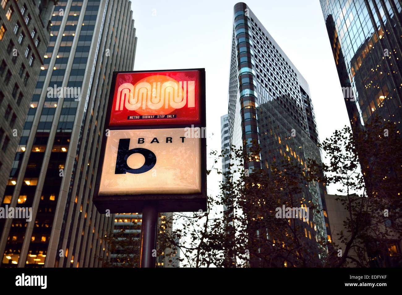 Lit sign at dusk for entrance to 'Bart' (Bay Area Rapid Transit ) on Market St. San Francisco California USA Stock Photo
