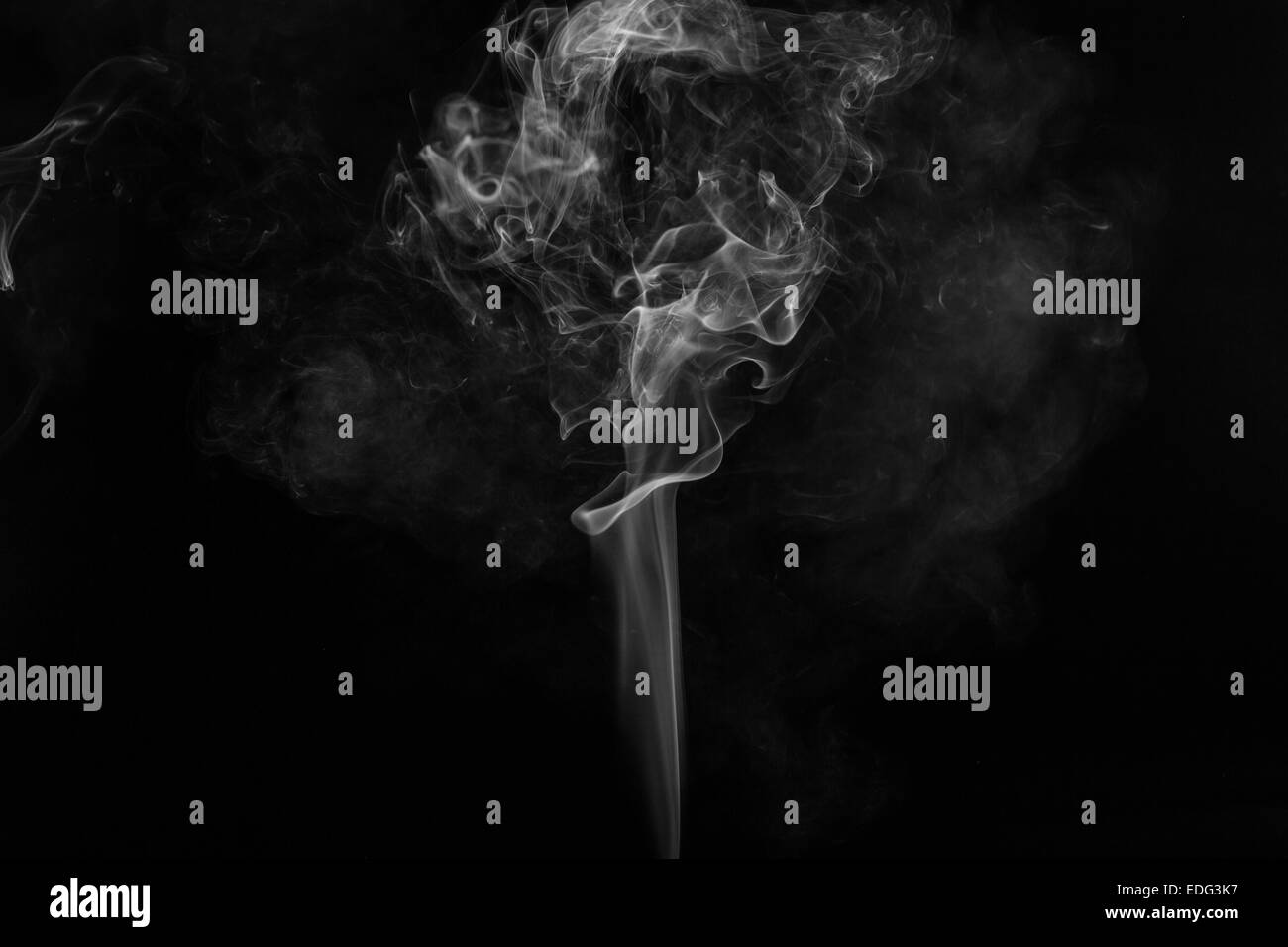 Abstract smoke moves on a black background Stock Photo - Alamy