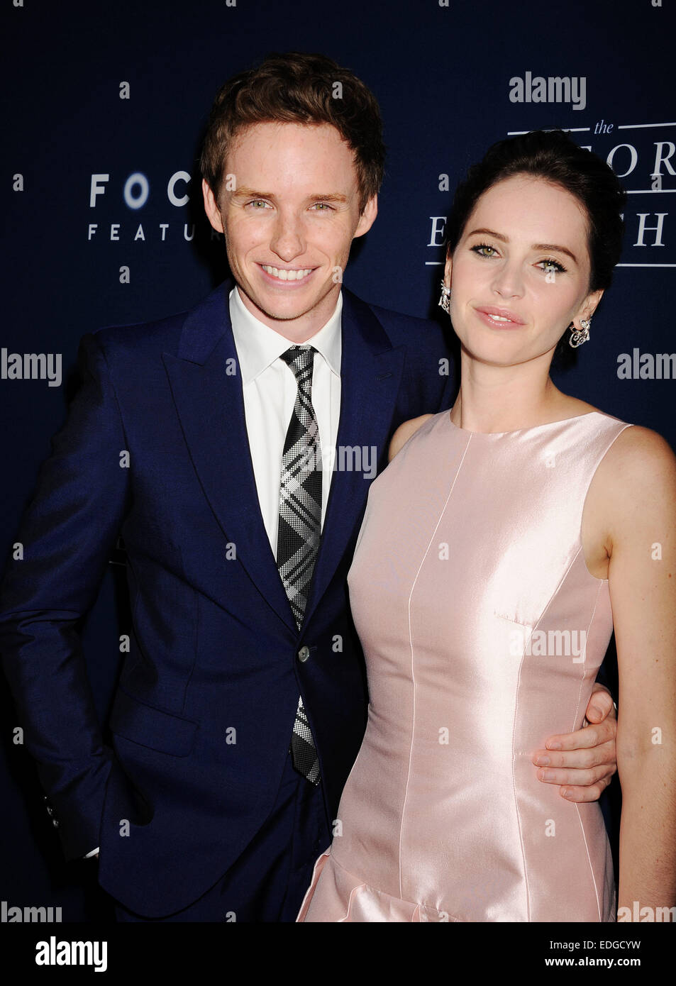FELICITY JONES and EDDIE REDMAYNE  at the Los Angeles premiere of 'The Theory Of Everything' at the AMPAS Samuel Goldwyn Theater, Beverley Hills, California, 28 October 2014 Stock Photo