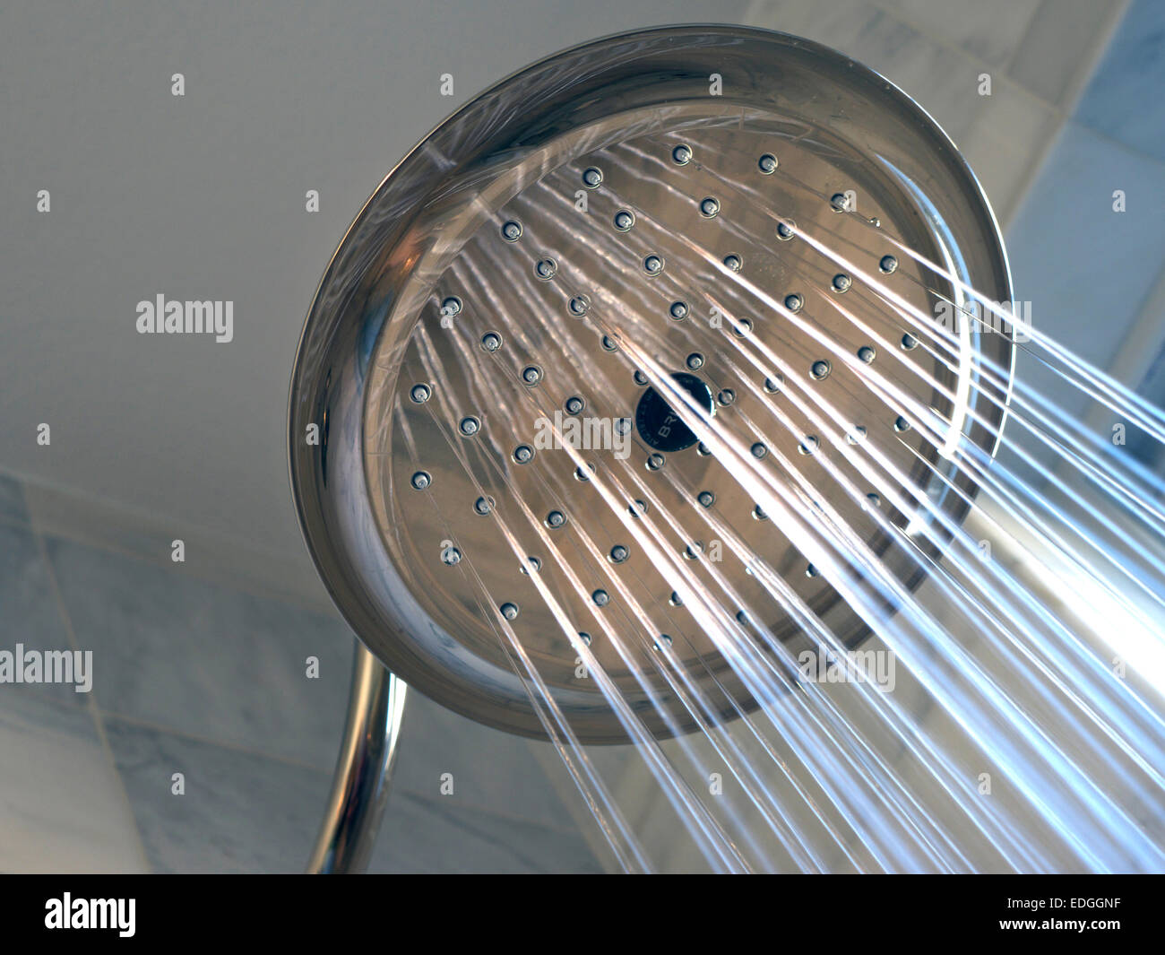 Shower Head luxury 'Monsoon' with water flow in marble bathroom Stock