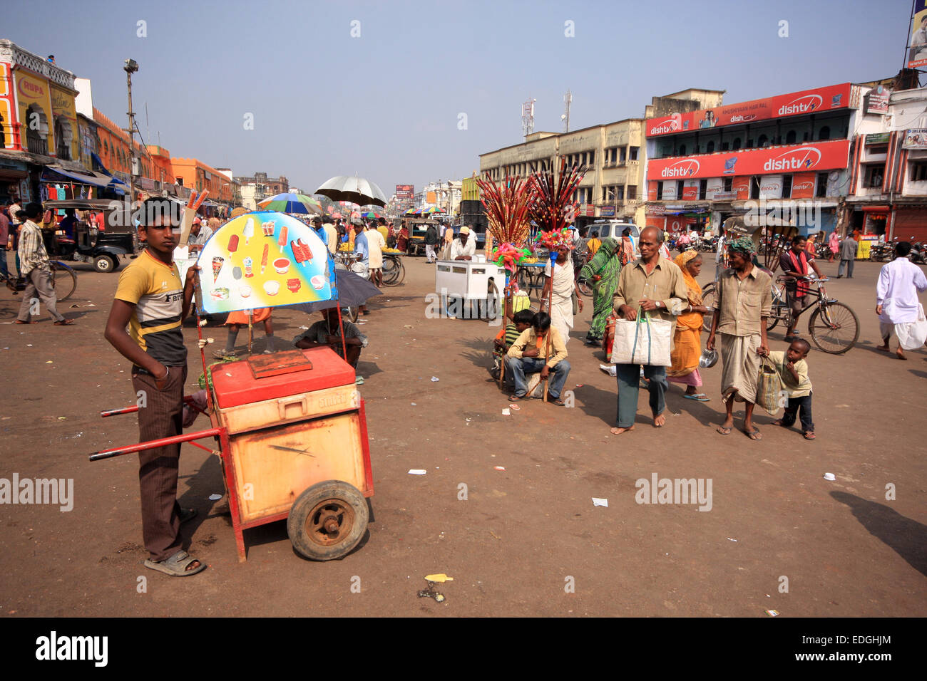 Boy selling icecream in the square outside the Jagannath Temple, Puri, India Stock Photo