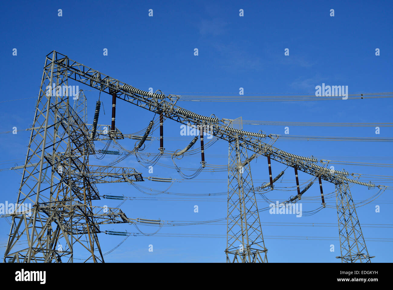 Electricity Transmission System High Voltage showing cables, wires and towers Stock Photo