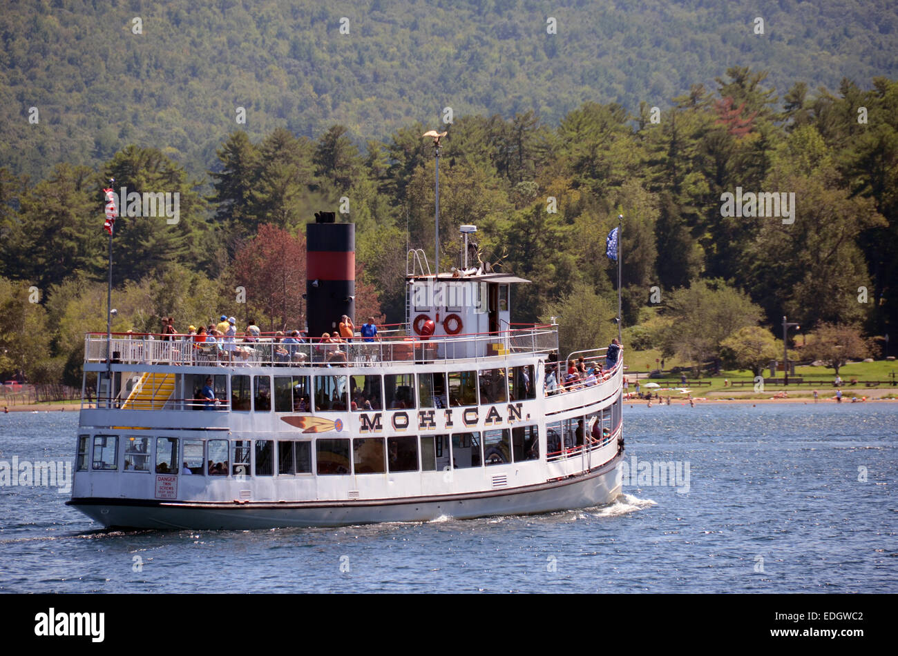 Lake George, USA - August 7, 2012: Tourists enjoy sightseeing along the shores of Lake George, new York State on August 7, 2012. Stock Photo