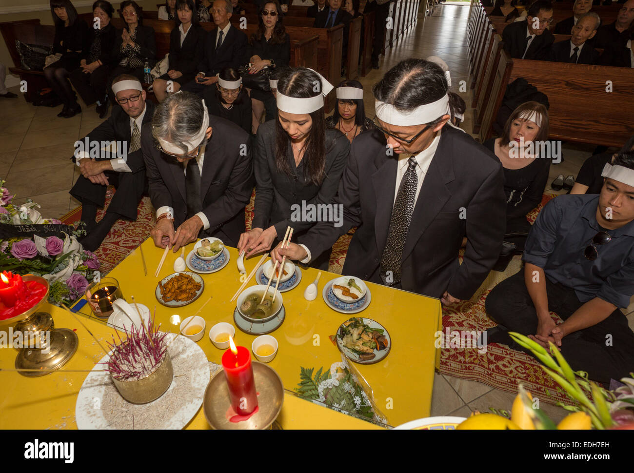 Family members, mourners at Vietnamese funeral service, Little Saigon