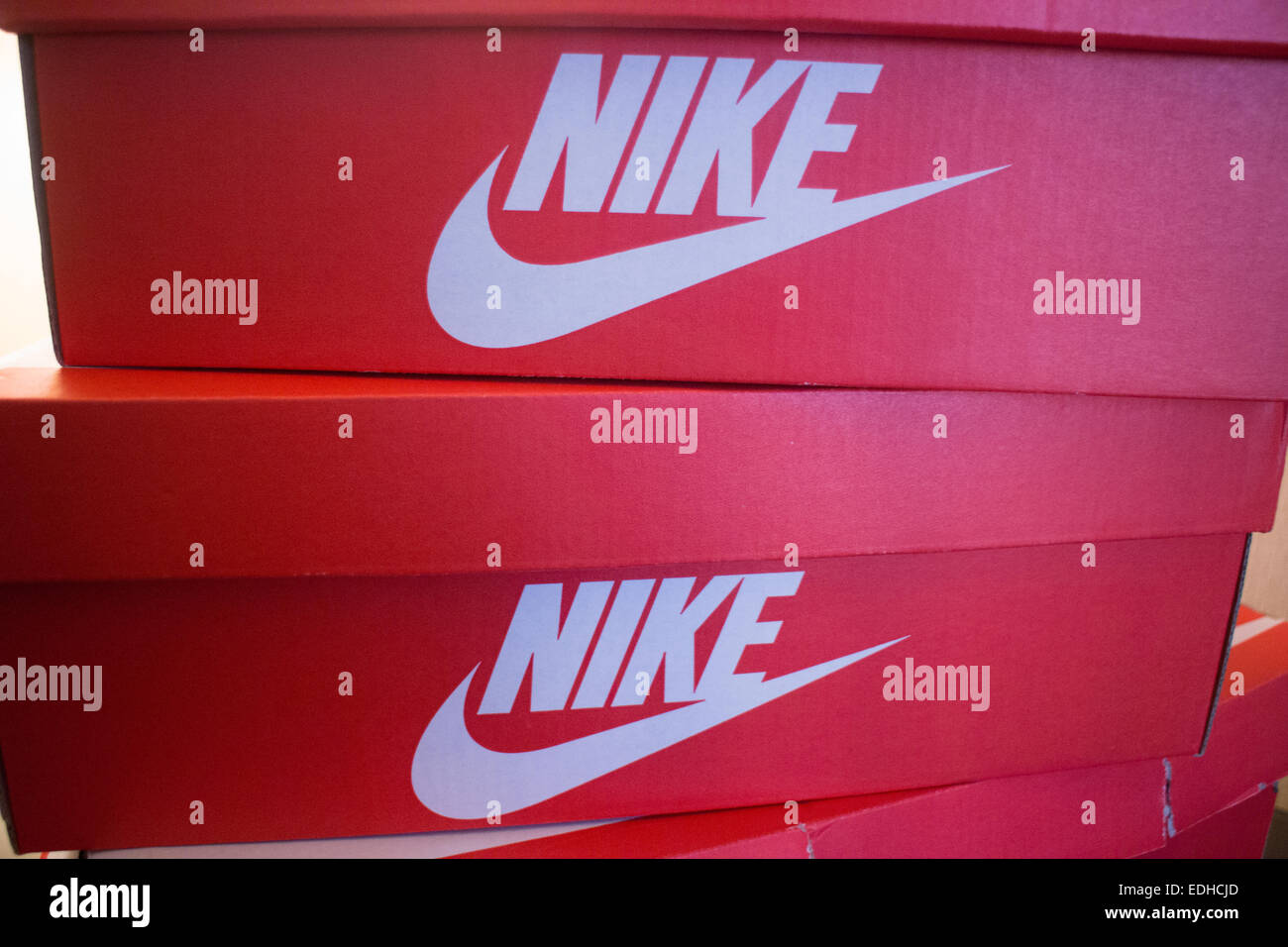 Las Vegas, Nevada, USA. 4 January 2015.Nike Trainer/ sneaker/sports shoes  boxes in a pile of three. Copyright of Denise Maxwell Stock Photo - Alamy