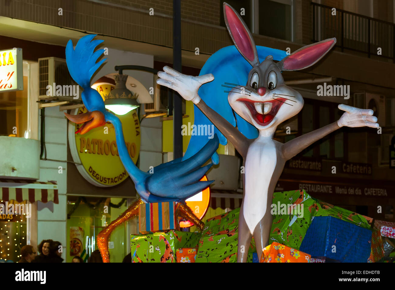 Bugs Bunny rabbit and roadrunner in the cavalcade of the Magi on the float gifts. Stock Photo