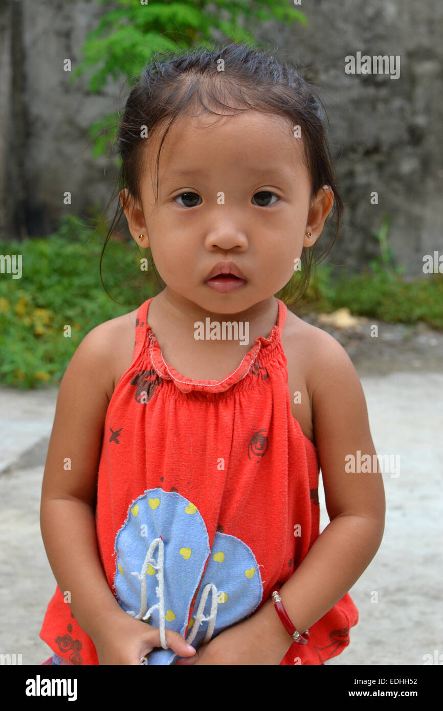 A portrait of beautiful asian little girl with innocent eyes Stock Photo