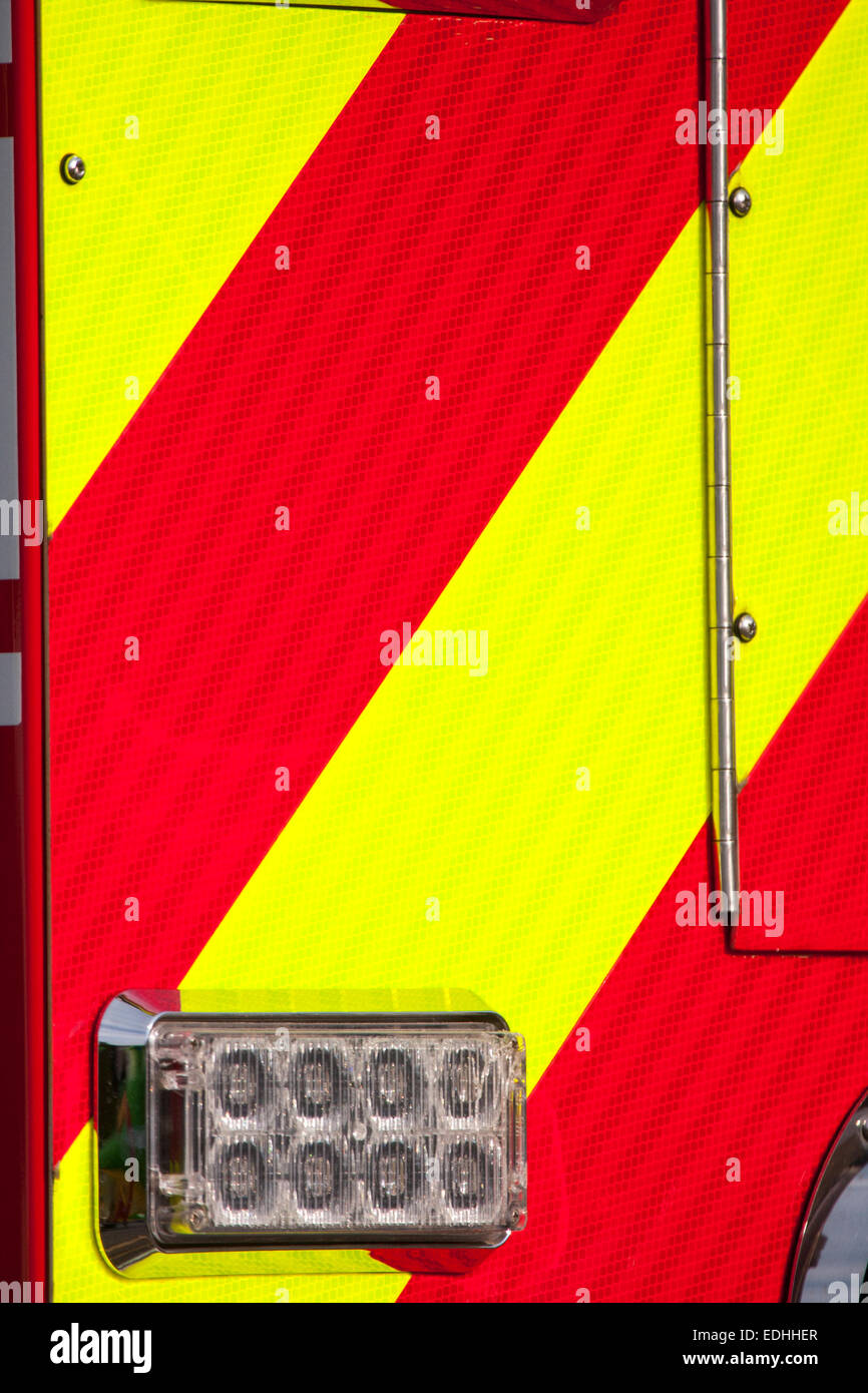 The red and yellow stripe on the back of an emergency vehicle in