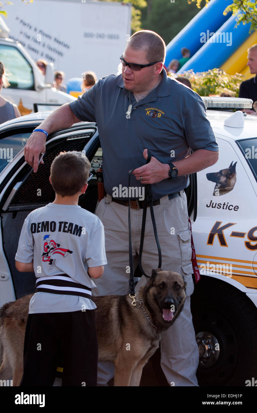 Waukesha WI Police Department K9 officer and his K9 dog Justice Stock