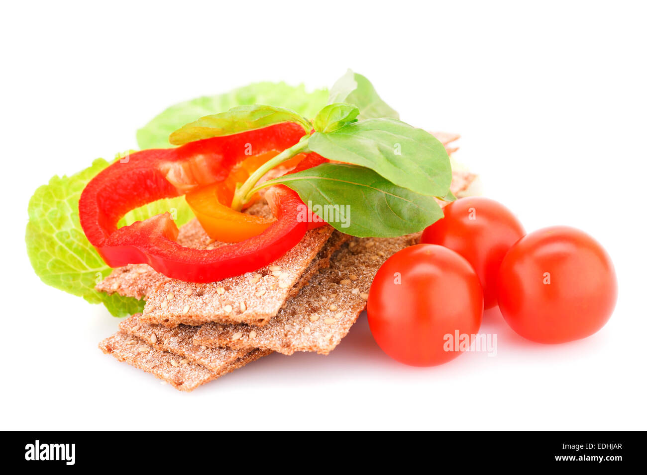 Crackers with fresh vegetables isolated on white background Stock Photo ...