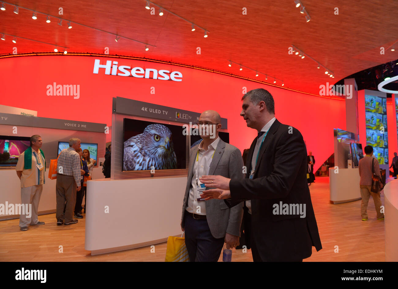 Las Vegas, USA. 6th Jan, 2015. Visitors view UHDTV at the booth of Chinee company Hisense during the 2015 International Consumer Electronics Show (CES) in Las Vegas, the United States, on Jan. 6, 2015. More than 1,000 Chinese enterprises participated in this year's CES. Credit:  Yin Bogu/Xinhua/Alamy Live News Stock Photo