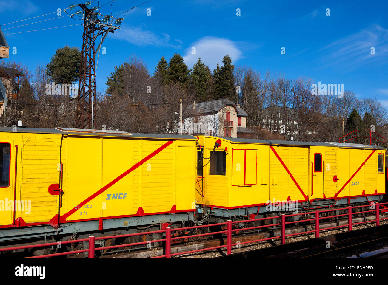 The Train Jaune, Yellow Train, Canari, or Ligne de Cerdagne, at the Mont-Louis - La Cabanasse station. Stock Photo