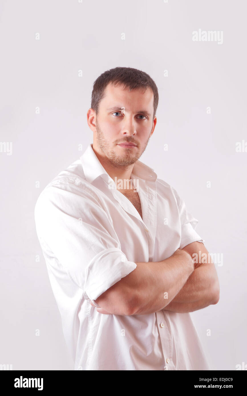 Man with white shirt over white background Stock Photo