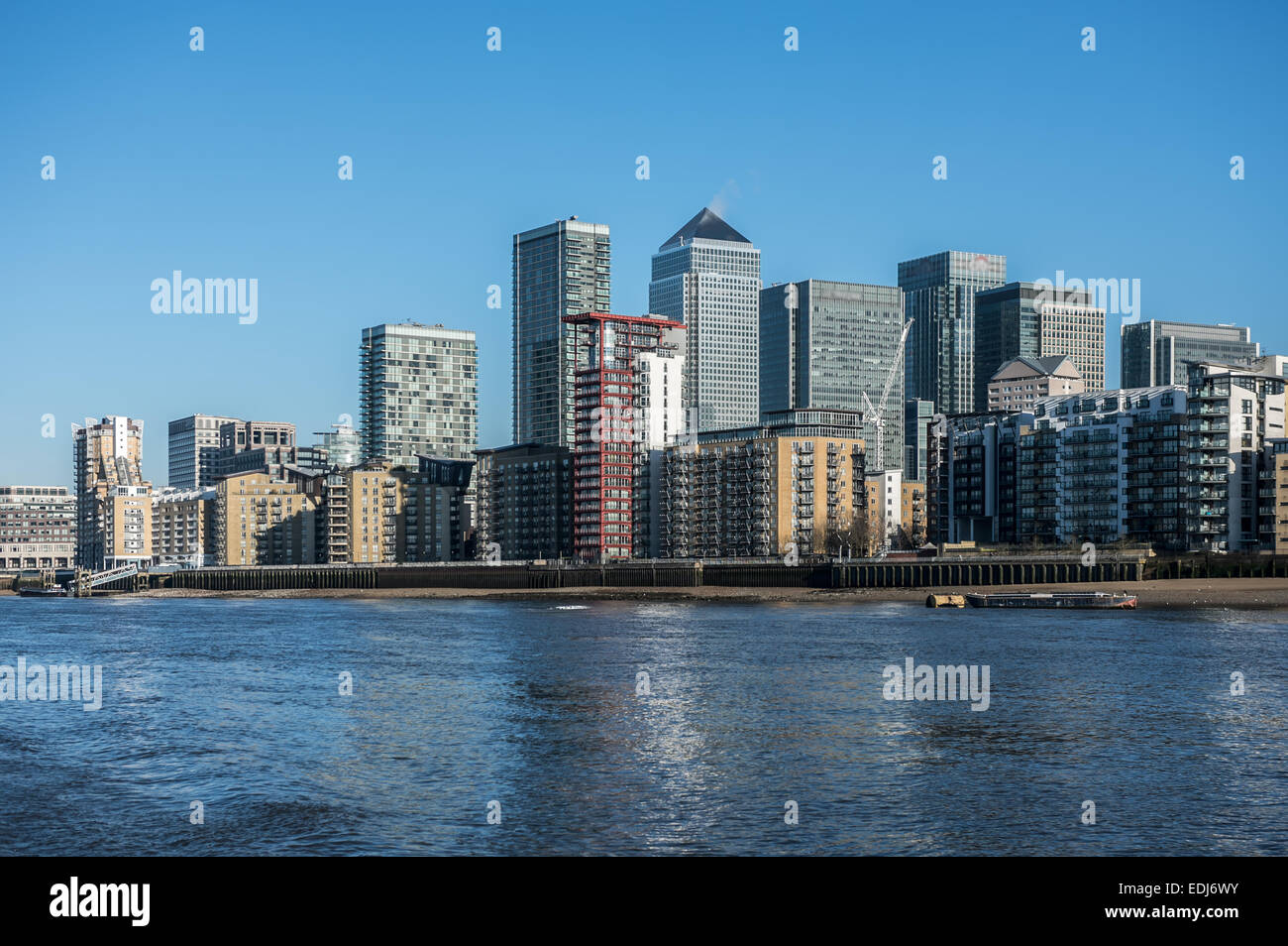 Skyscrapers of Canary Wharf seen from the river Thames in London Stock ...