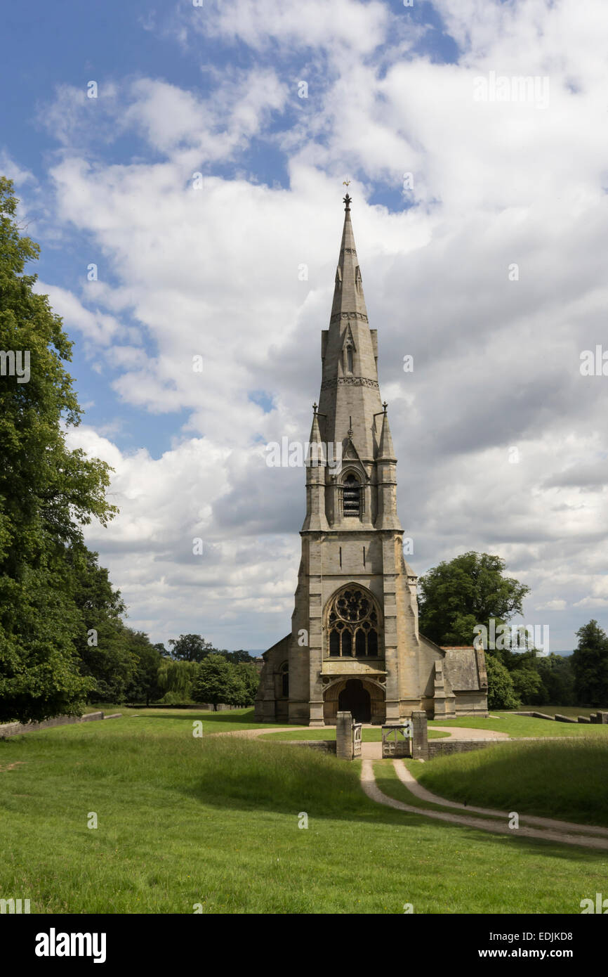 English rural church set in open countryside fields with no houses upright format Stock Photo