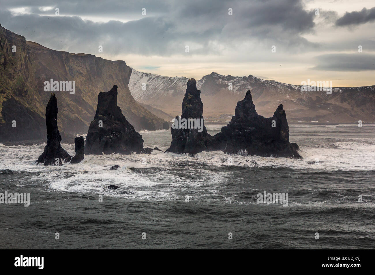 Basalt Sea Stacks and waves at Reynisfjara Beach located by Vik in Myrdal, South Coast of Iceland. Stock Photo