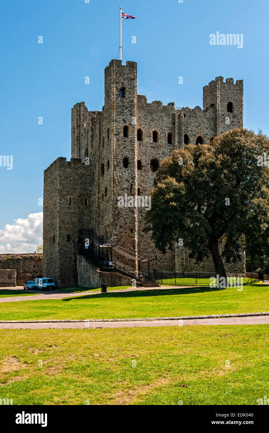The magnificent ruins of the dominating Keep of Rochester castle, built of Kentish ragstone, framed against a deep blue sky Stock Photo