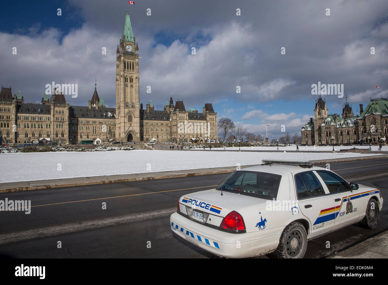 A RCMP police car is parked in front of the Parliament of Canada in Ottawa Stock Photo