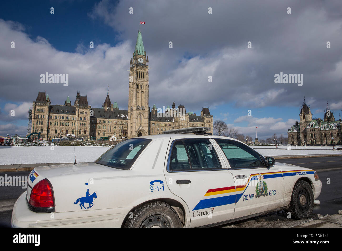 A RCMP police car is parked in front of the Parliament of Canada in Ottawa Stock Photo