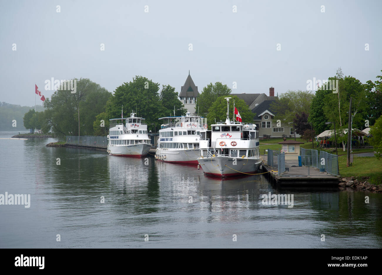 Boats belonging to the Gananoque Boat Line Thousand Islands Tour tied up at the dock, Gananoque, Ontario, Canada Stock Photo