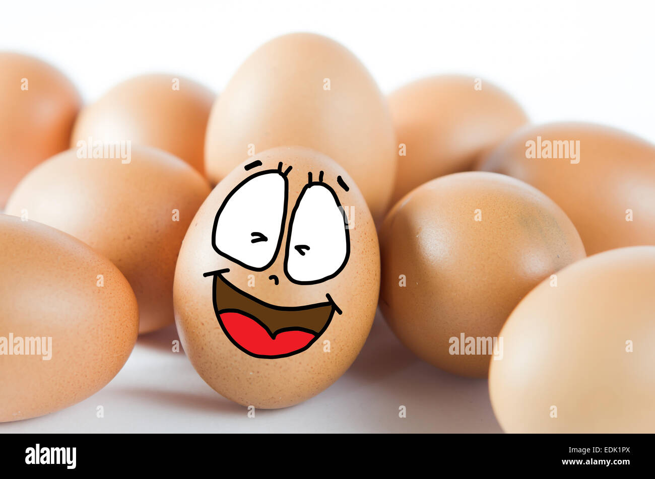 brown egg with happy face with  friend . Stock Photo