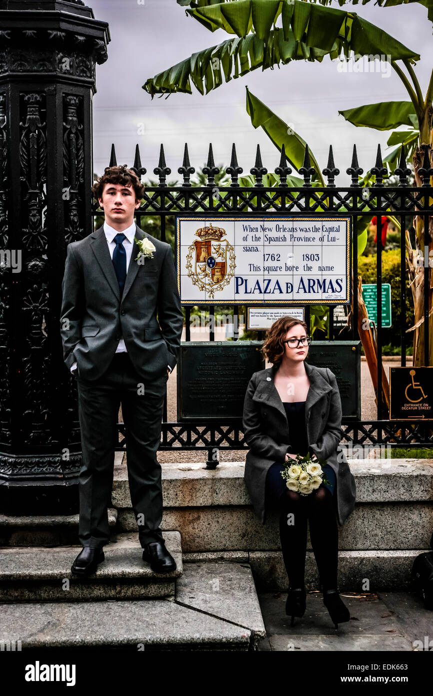 Two people at a wedding in New Orleans look miserable and unhappy as they wait for the cerimony to begin Stock Photo