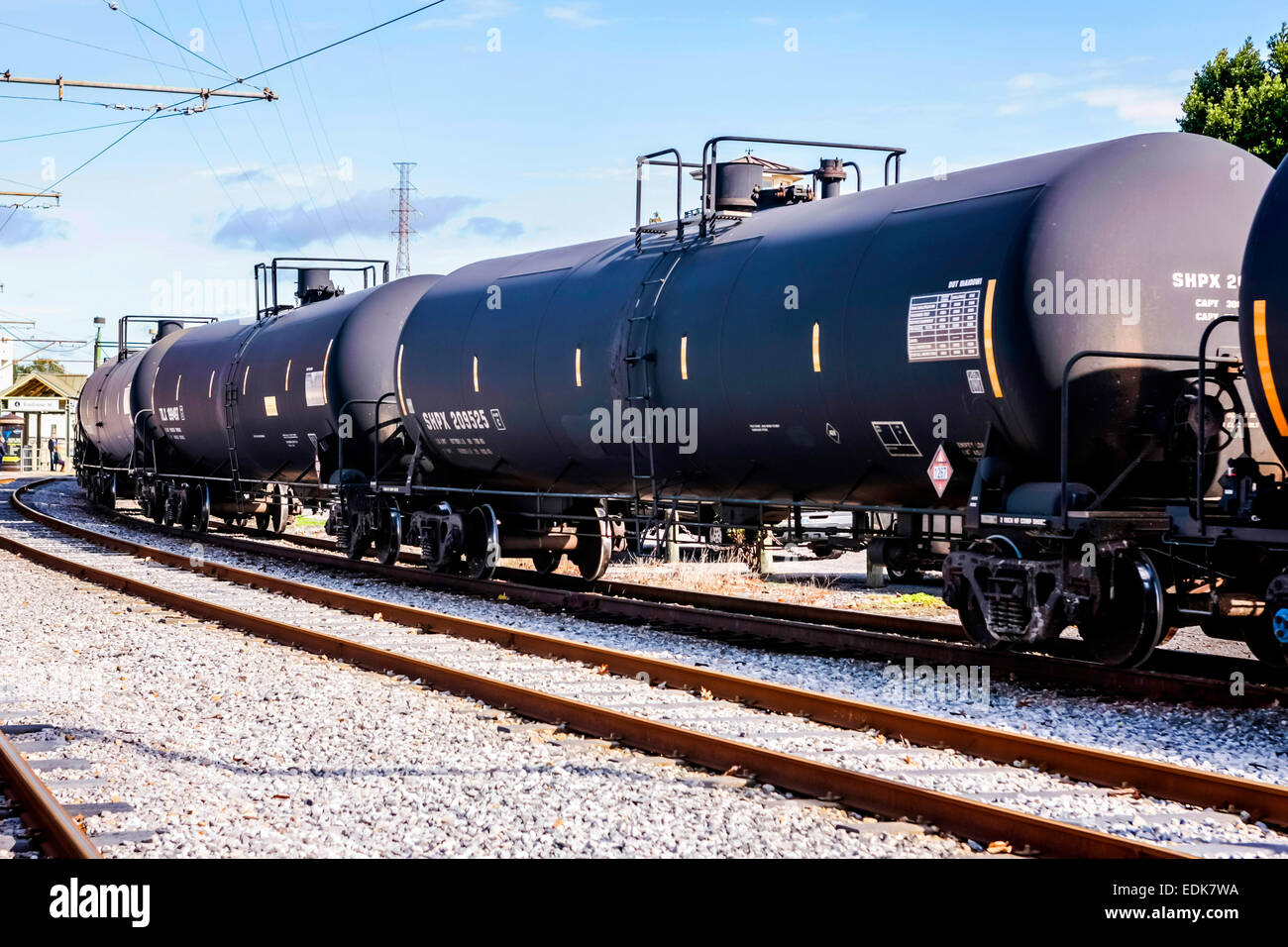 Crude Oil tanker rolling stock of the Burlington North and Santa Fe (BNSF)train passes through New Orleans LA Stock Photo